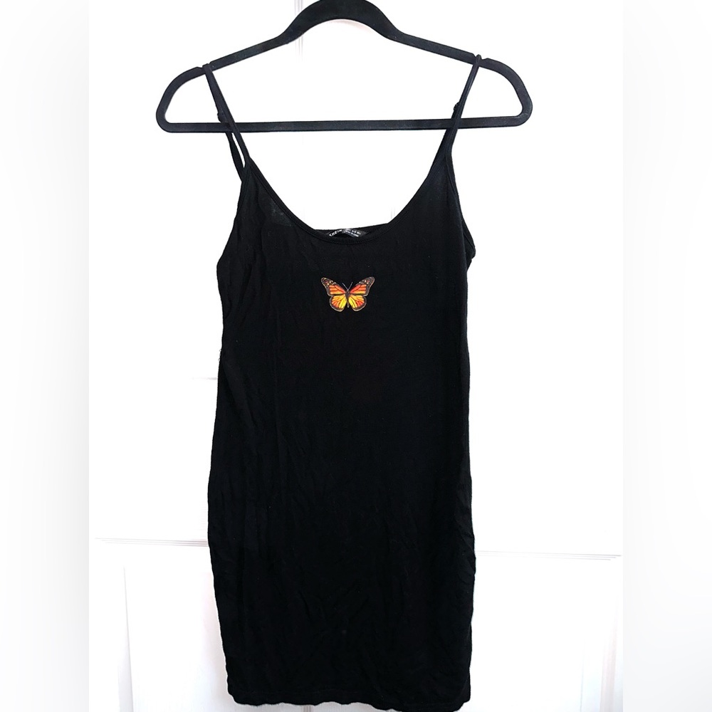 Black stretchy dress w/ butterfly in the middle